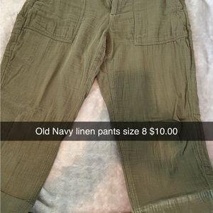 Green linen pants. Slightly cropped. Cute for summer